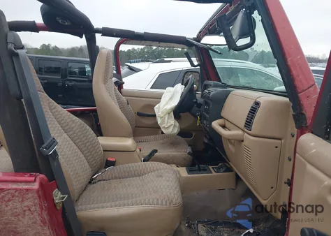 1999 Jeep Wrangler Sport z USA, uszkodzony, nr VIN 1J4FY19S4XP480214